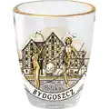 Szklana kieliszka 25 ml ze złotym obrzezem z nadrukiem w kolorze brązu przedstawiającym panoramę Bydgoszczy, spichlerze nad Brdą i postać łuczniczki – elegancka pamiątka turystyczna i produkt do sprzedaży hurtowej B2B, POL-WG-1495.