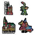 Zestaw 4 znaczków metalowych czarnych Kraków z motywami Smok Wawelski, hejnał i zabytki – pamiątka turystyczna hurtowo B2B, POL-ZN-002-2